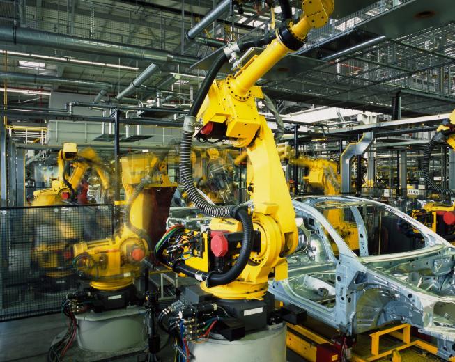welding_robots_car_factory2_depositphotos_4467637_original.jpg